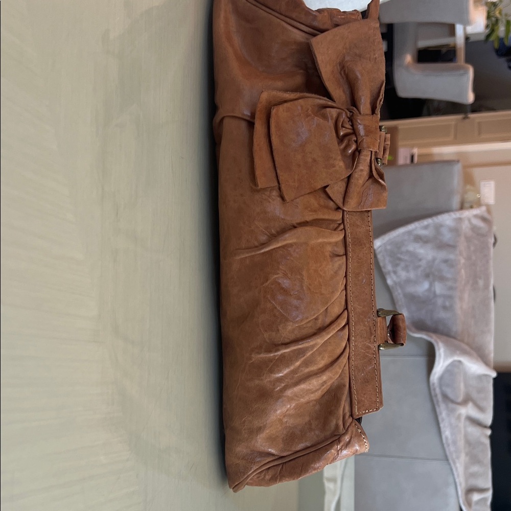 Elegant Brown Clutch with Bow Detail